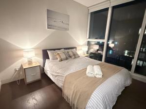 Golden Hours In Olympic Park with Free Parking Pool and View