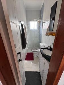 Casa condomínio Guilhermina PG