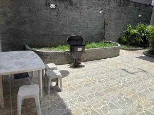 Casa para 8 pessoas com churrasqueira e garagem a 500m da praia