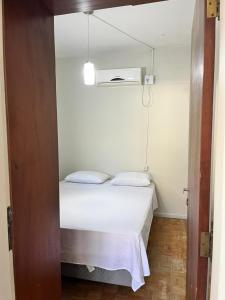 Casa ampla e confortável perto da praia, jardim, tranquilidade e ótima localização