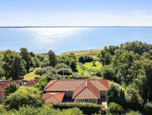 Swedish Timber House Overlooking Lake Arresø