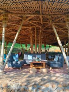 Cabanas ecologicas con vista espectacular y cascada privada - Finca Qawana Ecolodge en San Carlos