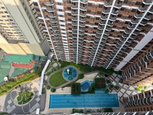 Pet Friendly1BR In Pasay Near Airport, Star City,PICC, CCP, MOA and US Embassy With Free WiFi, Swimming Pool, Gym and Netflix