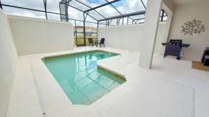 Modern Oasis at Storey Lake w 4BR & Heated Pool