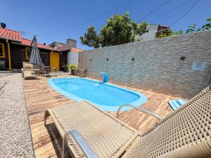 CASA FOCA 271 - casa aconchegante com piscina, churrasqueira, mesa de sinuca e pebolim