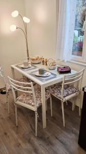 Tess House among woods and fields overlooking Trento