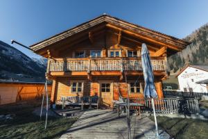 Schlosswirt Chalets & Apartments