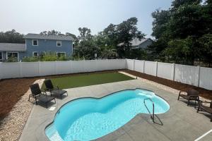 Oak Island Home with Pool Walk to Long Beach!