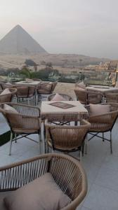 El Nabila Front Pyramids & Sphinx View