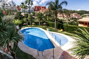 Sea View Apartment in Mijas Calahonda- 2 Communal Pools and Family-Friendly