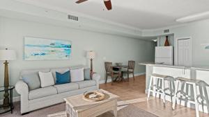 Beachfront Tidewater Resort Condo w Pools Beach Gear Hot Tubs Pier Park Nearby Tidewater Beach by AvantStay