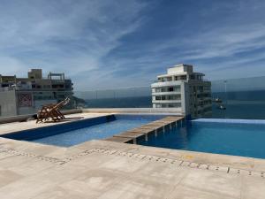 Coastal apartment with pool access and viewpoint