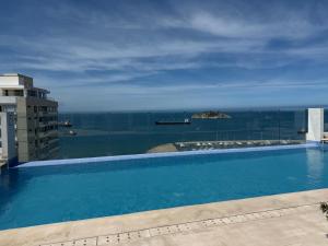Coastal apartment with pool access and viewpoint