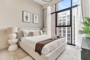 Free housekeeping visits during your stay - StayShort - Sleeps 4 Modern 1BR at Azizi Riviera 47