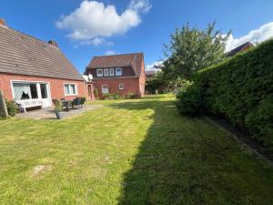 Vier Nordlichter EG-Wohnung mit direktem Gartenzugang