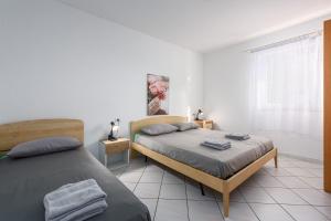 Hundefreundliches Apartment nur 60 Meter zum Strand mit Privatparkplatz, Klima, WiFi