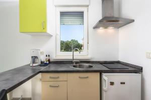 Lichtdurchflutetes Studio-Apartment nur 500 Meter zum Strand mit Grillbereich