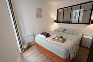 Charmant cocon iodé cosy équipé, baigné de lumière, situé au cœur de La Rochelle à 1min à pied du marché central avec TV et Wifi