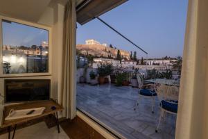 Wake Up to the Acropolis in a Hidden Gem