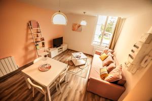 Appartements Le Millesime : photos des chambres