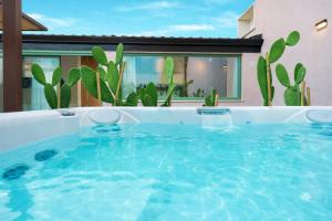 Vico Trigona con terrazza e jacuzzi riscaldata
