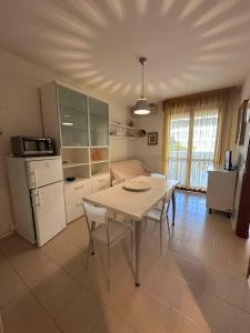 Modern flat with shared pool and sea side view