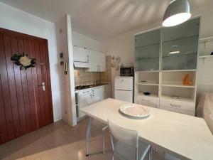 Modern flat with shared pool and sea side view