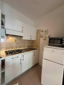 Modern flat with shared pool and sea side view