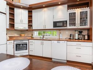 Holiday Home Paltamon golfhovi b by Interhome