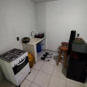 Suite com cozinha 250m do centro