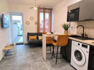 Le 101 -T2 avec terrasse, commerces & gare à pied