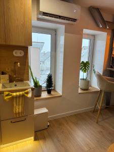 Apartmán Koperník - súkromné parkovacie miesto