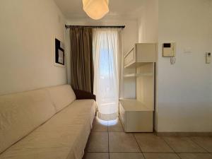 Bright apartment with swimming pool and solarium