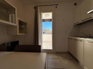 Bright apartment with swimming pool and solarium