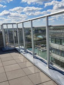 Duplex met zonnig zuidterras aan haven en zee