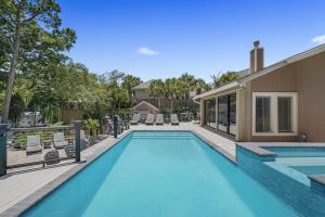 Coastal Soul - Secluded Lakefront Home with Private Pool Area & Golf Cart
