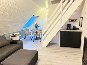 Nessmersiel, Ferienwohnung mit Balkon in Deichnähe, Wallbox, renoviert