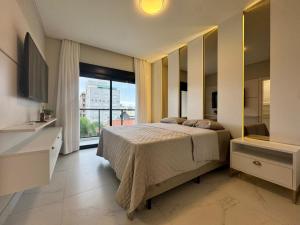 Invictus Residence 202 - Apartamento Frente Rua Decorado na Praia de Palmas a 4 Minutinhos do Mar