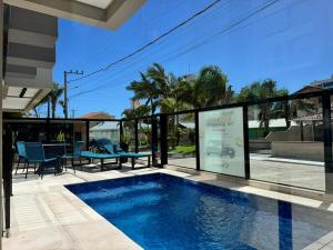 Invictus Residence 202 - Apartamento Frente Rua Decorado na Praia de Palmas a 4 Minutinhos do Mar