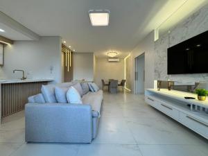 Invictus Residence 202 - Apartamento Frente Rua Decorado na Praia de Palmas a 4 Minutinhos do Mar