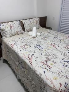 Apartamento confortável com suíte na Praia Grande
