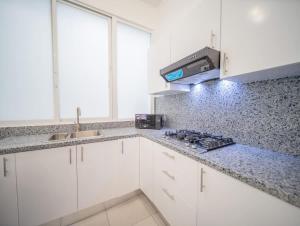Plaza Achim 6B, Modern APT 250m from Sosua beach!