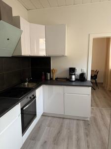 Gemütliche 2-Zimmer im Erdgeschoss mit guter Anbindung