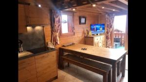 Duplex style Chalet pieds des pistes Domaine Les Saisies - 8 à 10pers