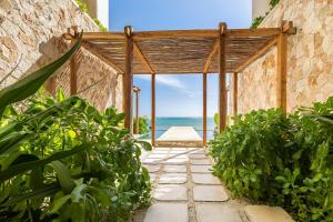 Beachfront 2BR Condo in Bahía Tankah, Tulum