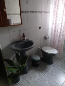 Casa Confortável Com Garagem e Vista em caraguá