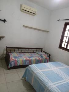 Casa Confortável Com Garagem e Vista em caraguá