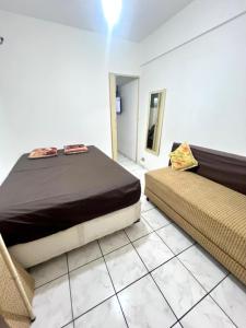 Apto no Boqueirão, 3 minutos da Praia a Pé, vaga de garagem rotativa e Wi Fi