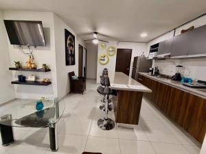 Hermoso y Comfortable Departamento 15 min del Aeropuerto