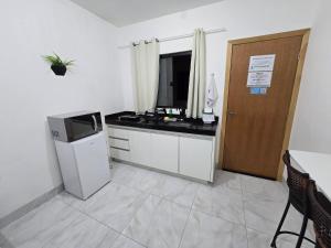 Flat 04 com lavanderia na entrada e feira as domingo e quartas